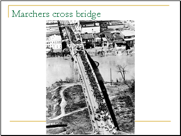 Marchers cross bridge