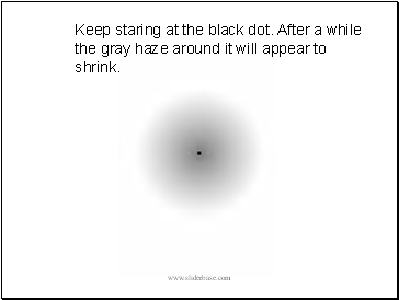 Keep staring at the black dot. After a while the gray haze around it will appear to shrink.