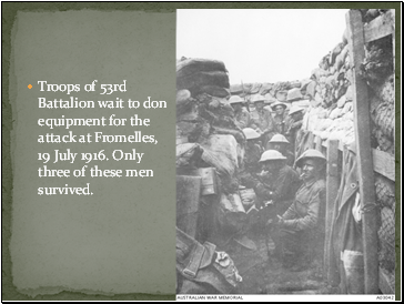 Troops of 53rd Battalion wait to don equipment for the attack at Fromelles, 19 July 1916. Only three of these men survived.